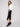Stylish black crepe skirt with practical front patch pockets, blending fashion and function by Charlie B.