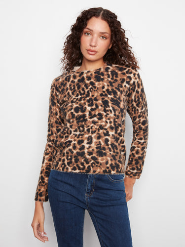 Leopard print sweater with a cozy crew neck design, adding a touch of wild elegance to any outfit. By Charlie B.