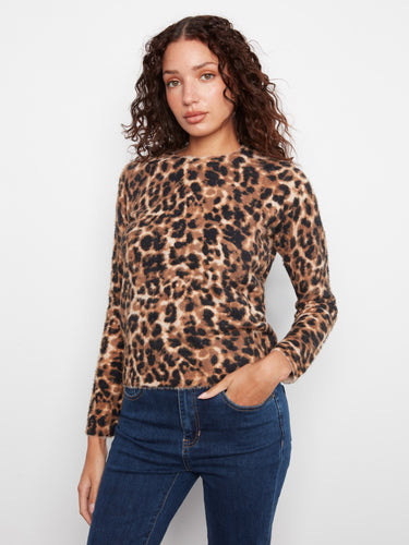 Stylish and comfortable, this crew neck sweater boasts an eye-catching leopard pattern. By Charlie B.