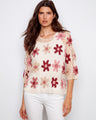 Elegant floral crochet top with a handcrafted design, featuring a crew neckline in carnation color by Charlie B.