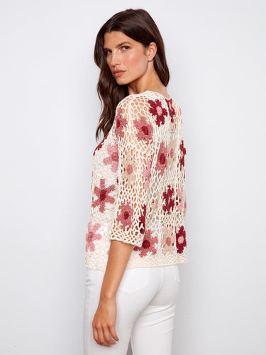 Intricate floral crochet design on this top offers a chic look, complete with comfortable 3/4 sleeves by Charlie B.