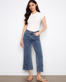 Medium blue wide-leg jeans with a cropped length, featuring heart cutouts and a five-pocket design by Charlie B.