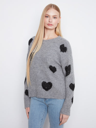 A perfect blend of style and comfort, this grey sweater showcases unique design elements by Charlie B.