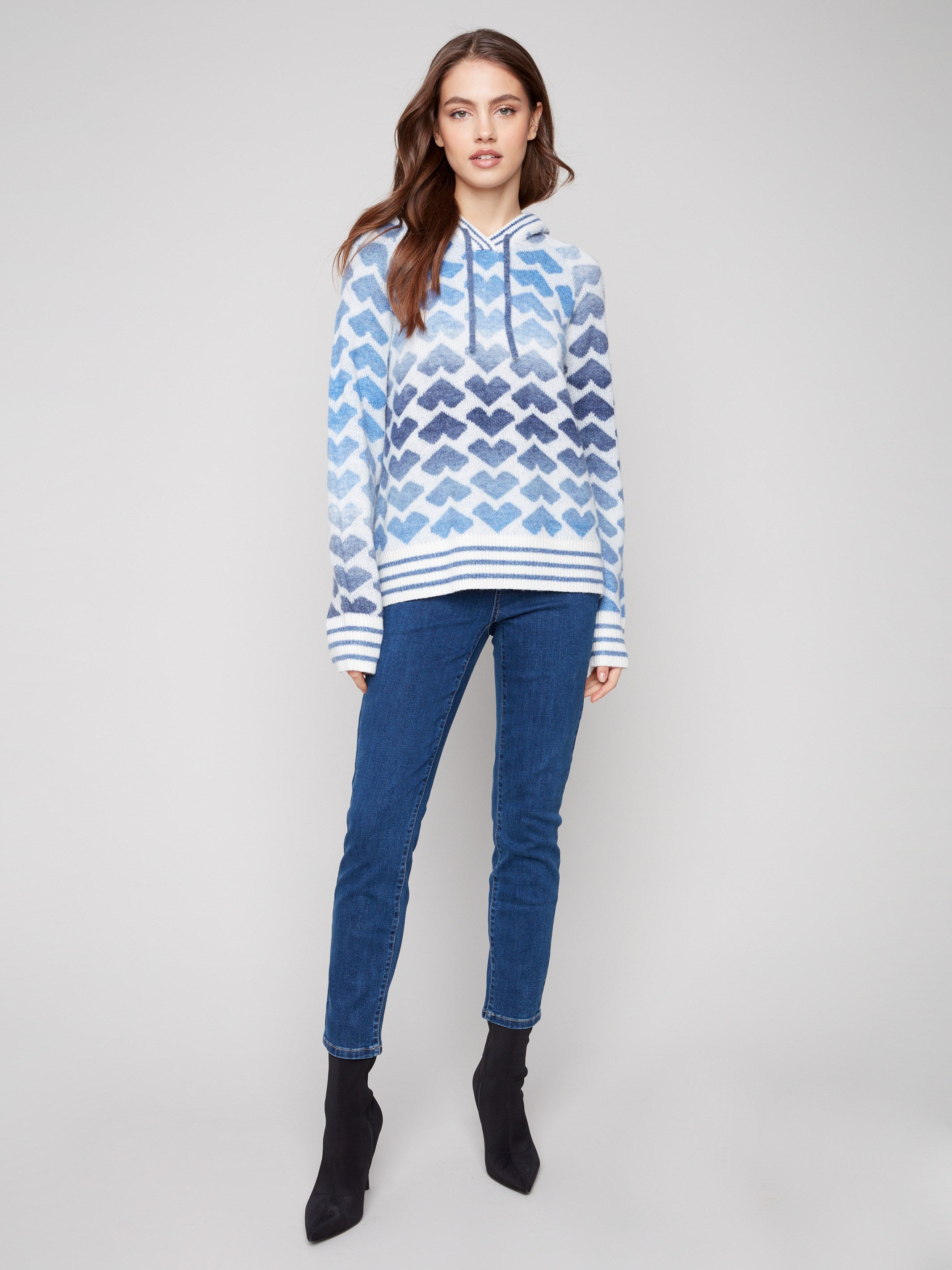 Stylish sweater with elastic ribbed cuffs and a lovely blue gradient pattern by Charlie B.