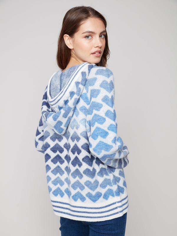 Heart-patterned sweater showcasing the chic drawstring hood detail by Charlie B.