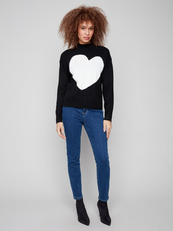 This sweater features an intarsia heart design, adding charm to its classic look by Charlie B.
