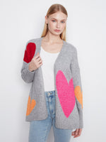 Heather-grey cardigan with colorful heart prints and relaxed fit, featuring convenient side pockets for a cozy look by Charlie B.