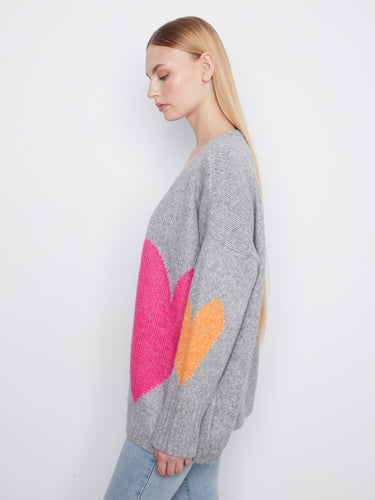 Cozy heather-grey cardigan featuring colorful hearts and drop shoulders, adding playful flair to any outfit by Charlie B.