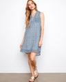 Dress featuring a half-button design and geometric pattern by Charlie B.