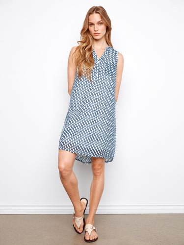 Knee-length dress showcasing elegant geometric patterns by Charlie B.