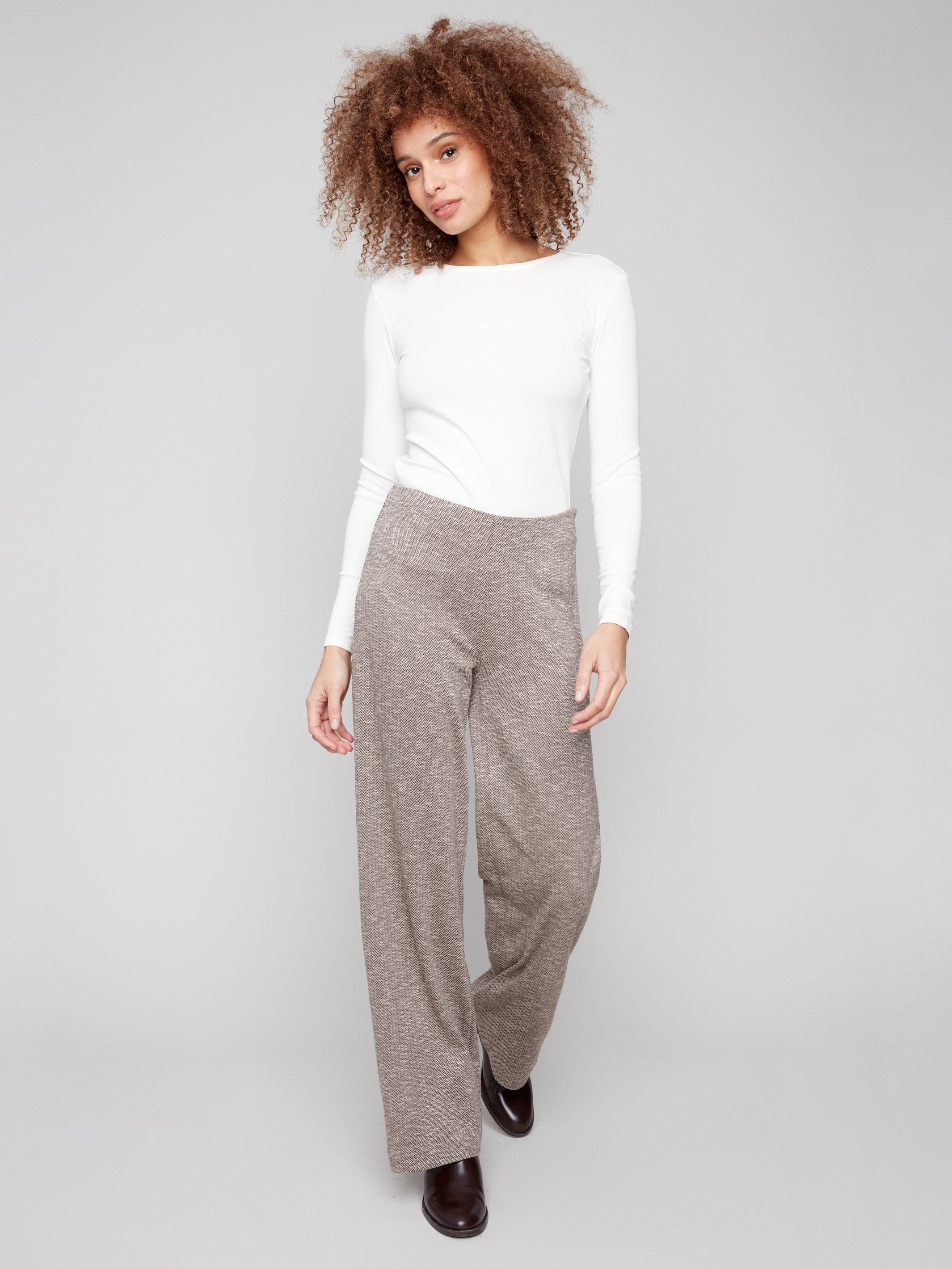 Mocha-colored herringbone pants by Charlie B with a flattering wide-leg silhouette, ensuring a stylish and relaxed fit.