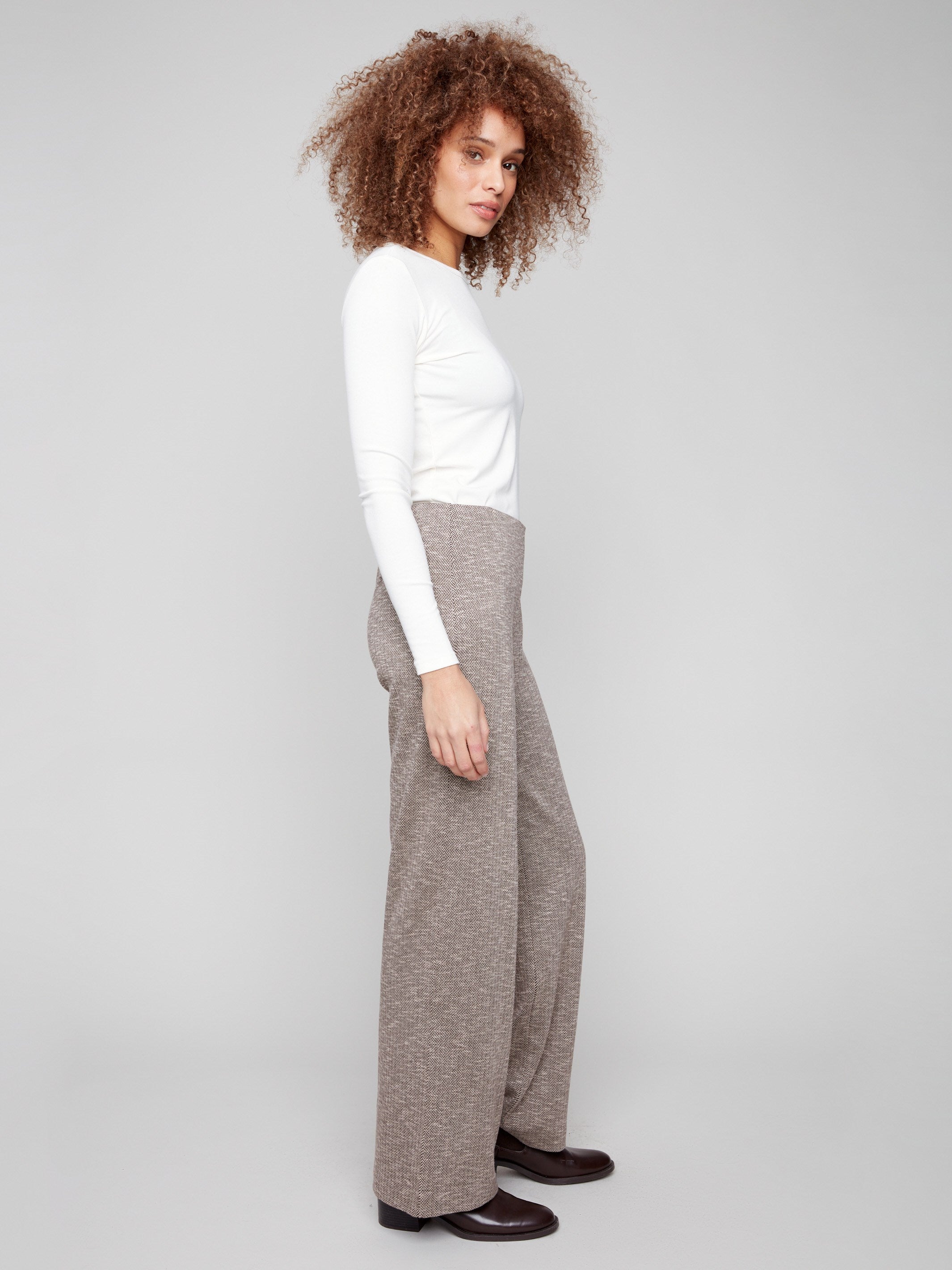 Long length mocha herringbone pants by Charlie B offer an elegant look, perfect for any sophisticated wardrobe.