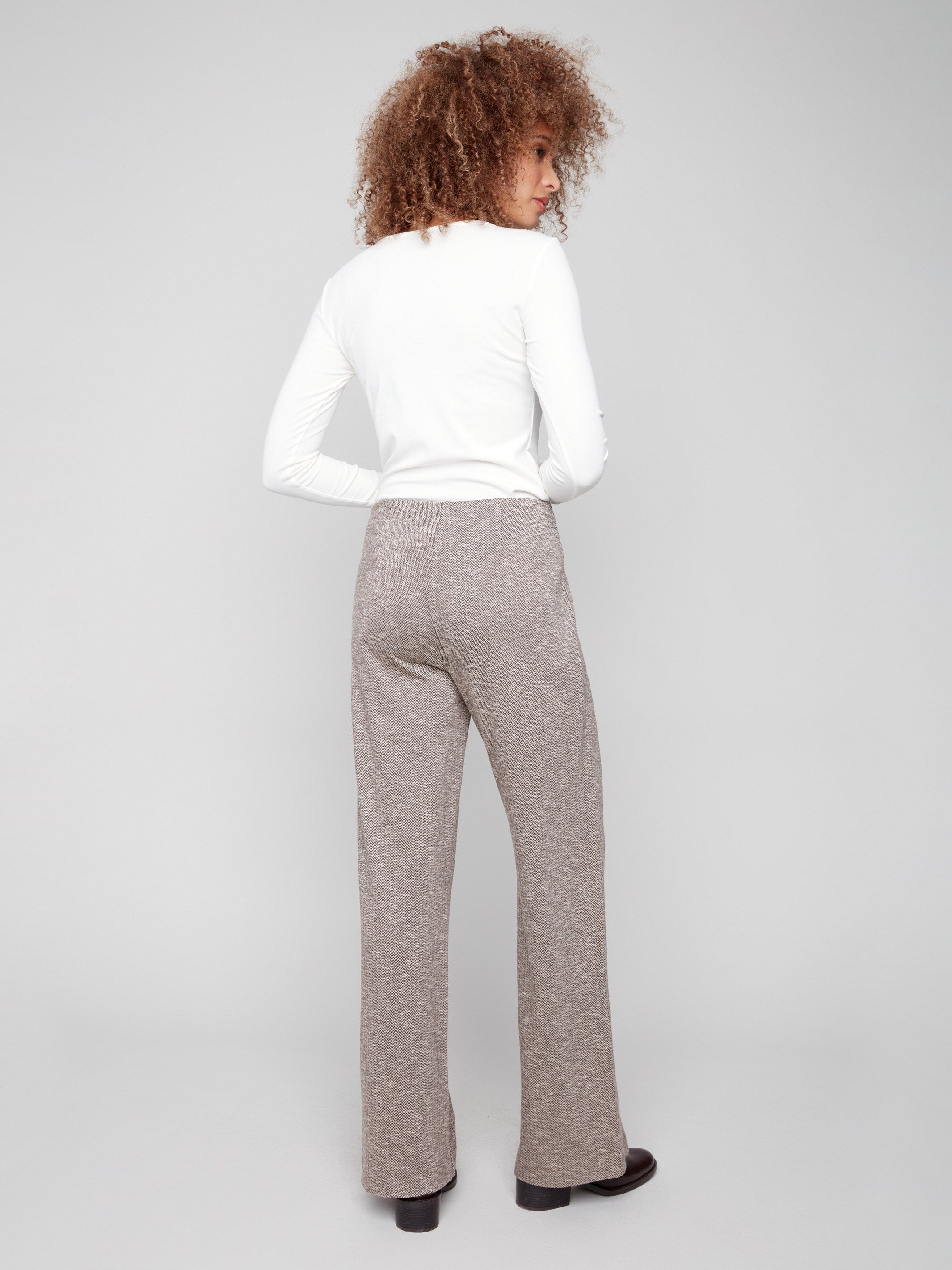 Crafted from stretch fabric, these mocha-colored wide-leg pants by Charlie B provide comfort without compromising on style.