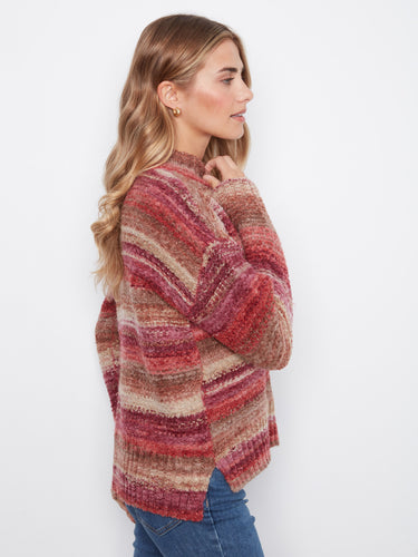 Fashionable drop shoulders enhance the relaxed fit of this striped sweater, ideal for effortless layering by Charlie B.