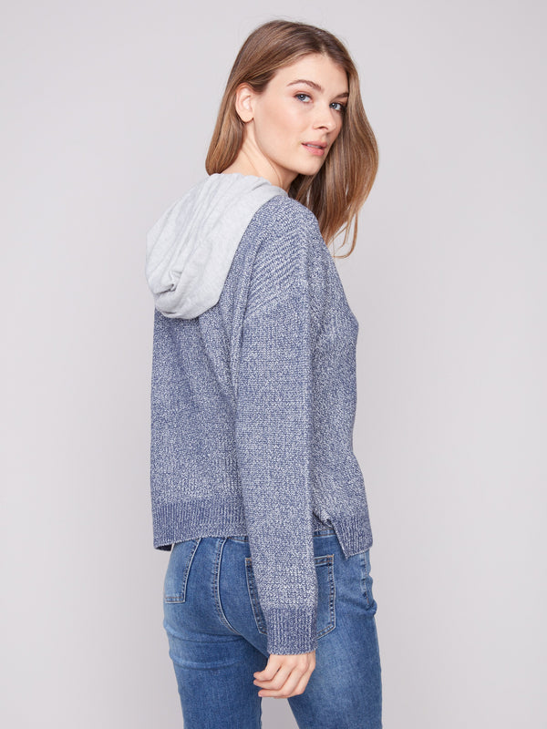Denim hoodie featuring a chic hem slit, adding flair to the classic design by Charlie B.