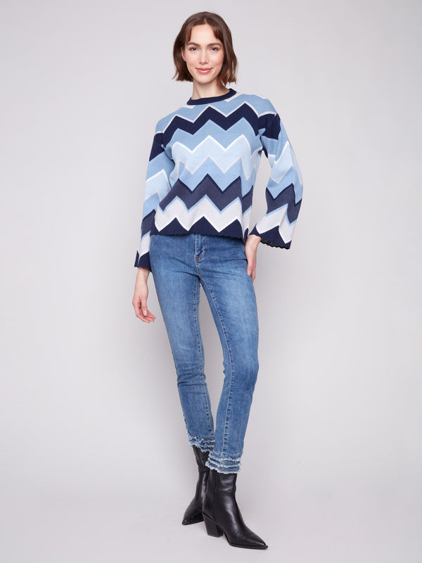 Elegant blue sweater with eye-catching chevron design and comfortable crew neckline, ideal for layering by Charlie B.