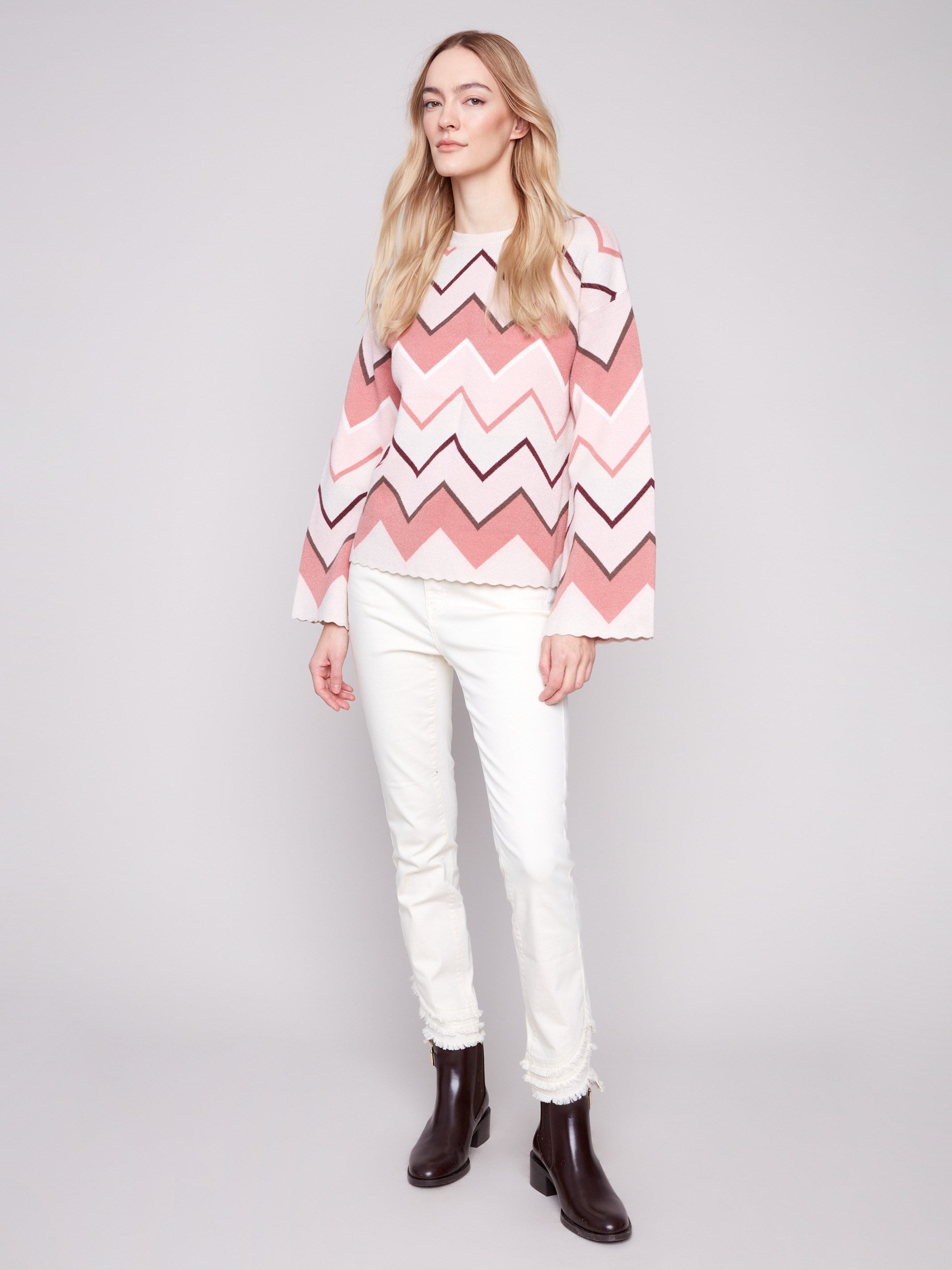 This sweater showcases a unique chevron pattern, creating an eye-catching design perfect for any occasion by Charlie B.