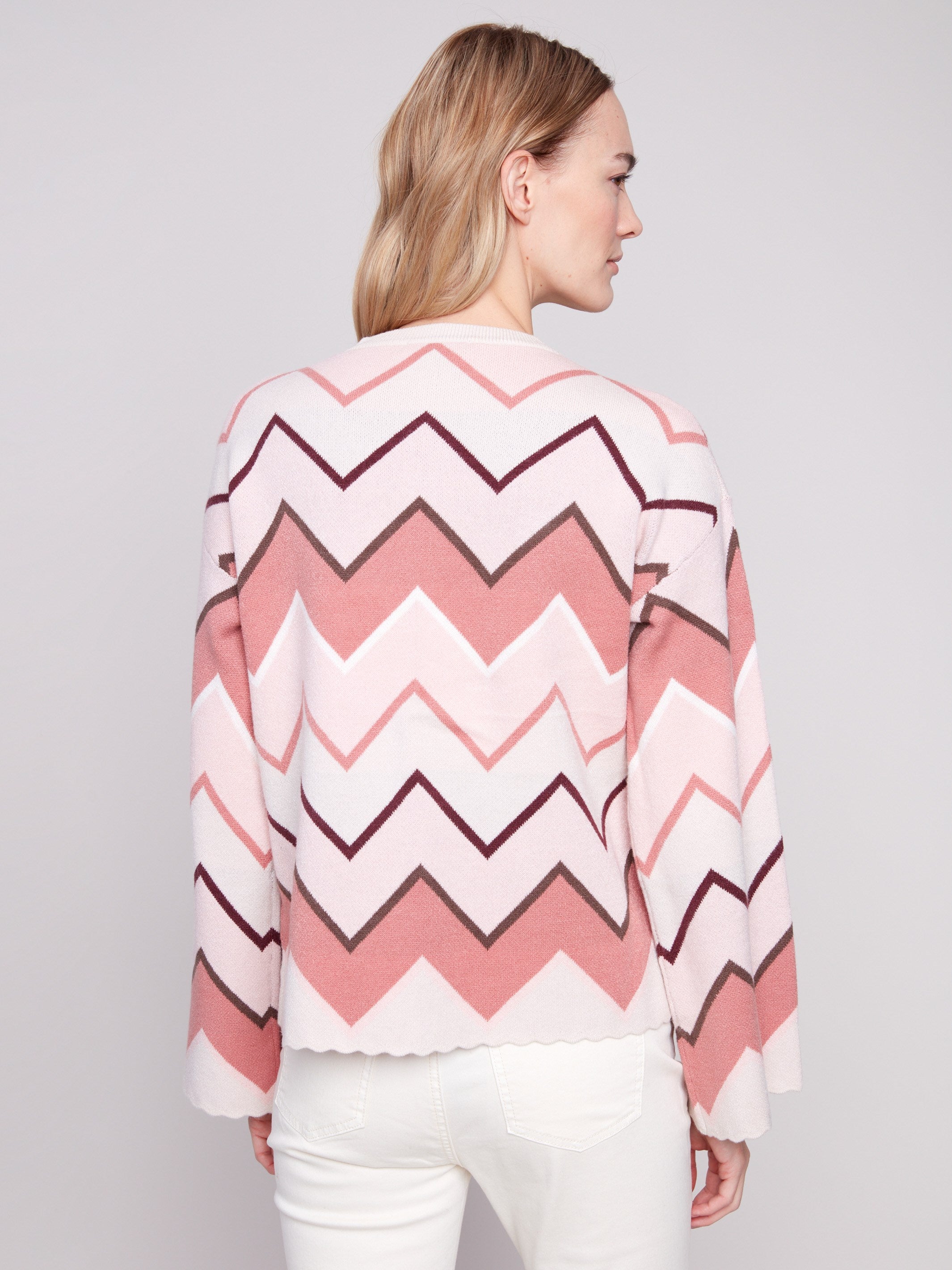 Featuring bell sleeves, this sweater adds a touch of flair and movement to your wardrobe essentials by Charlie B.
