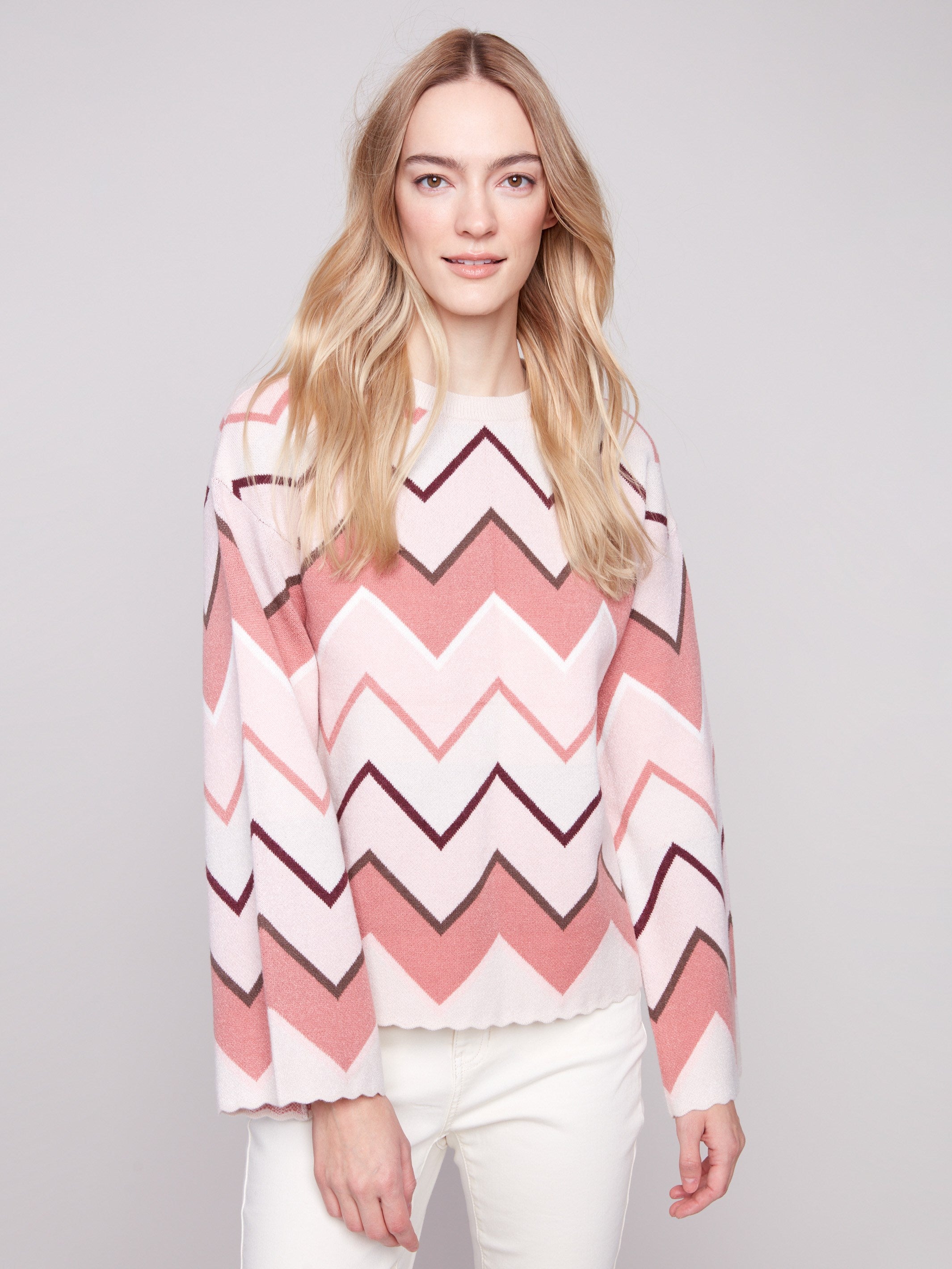 A chic chevron pattern enhances this cozy sweater with its classic crew neckline design by Charlie B.