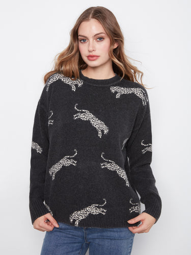 Black sweater with wildcat pattern, featuring ribbed cuffs and hem for a snug fit by Charlie B.