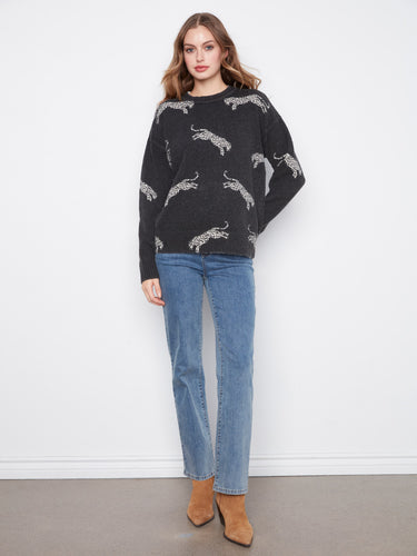 Wildcat pattern sweater showcasing the stylish drop shoulder design by Charlie B.