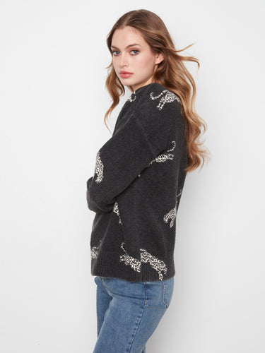 Chic black sweater with eye-catching wildcat motif and ribbed hem accents by Charlie B.