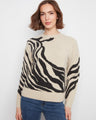 A stylish sweater featuring a classic crew neck, perfect for casual outings or cozy days indoors. By Charlie B.