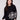 Black sweater showcasing a relaxed fit with intricate jacquard floral design, perfect for stylish comfort by Charlie B.
