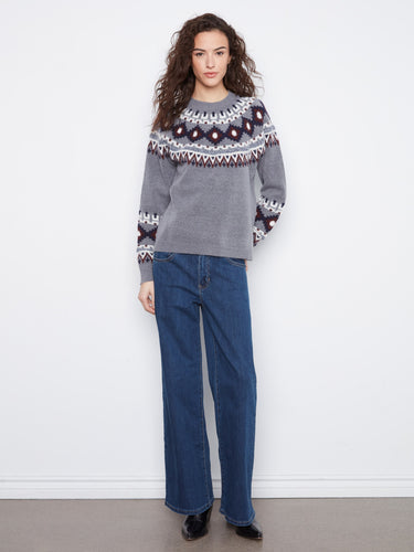 Sweater showcasing jacquard fair isle pattern and long raglan sleeves for a cozy look by Charlie B.