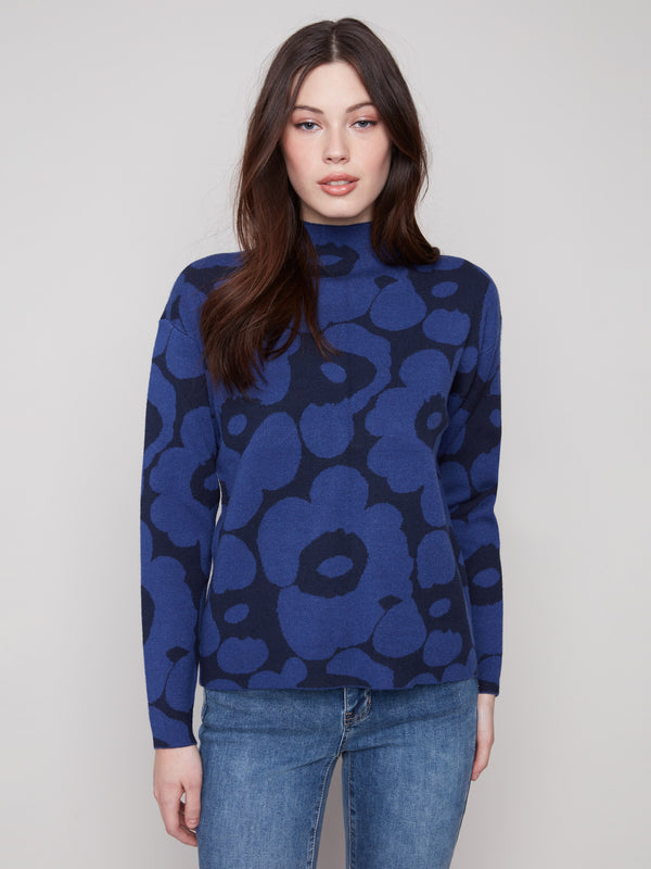 Elegant blue floral-patterned jacquard sweater with a mock neck, offering a chic slim fit by Charlie B.