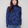 Elegant blue floral-patterned jacquard sweater with a mock neck, offering a chic slim fit by Charlie B.