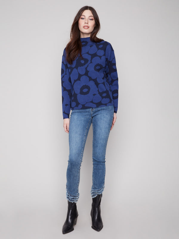 Sophisticated slim-fit sweater in blue aura with an eye-catching floral pattern and long sleeves by Charlie B.