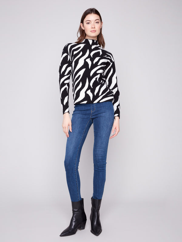 Chic zebra-patterned sweater featuring long sleeves, ideal for adding a statement to your wardrobe essentials by Charlie B.
