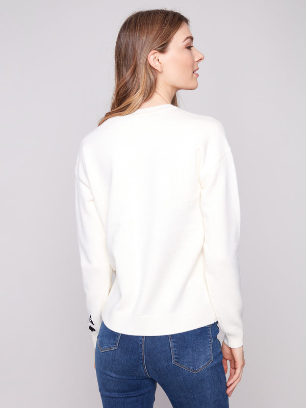 Elegant plush knit sweater with crew neck style, adorned with bold heart motif by Charlie B.