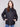 Black quilted puffer jacket featuring a stylish drop shoulder design and zip front closure by Charlie B.
