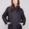 Black quilted puffer jacket featuring a stylish drop shoulder design and zip front closure by Charlie B.