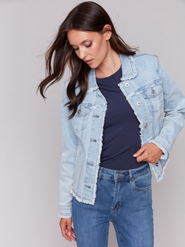 Bleach blue denim jacket with frayed edges and front pockets by Charlie B.