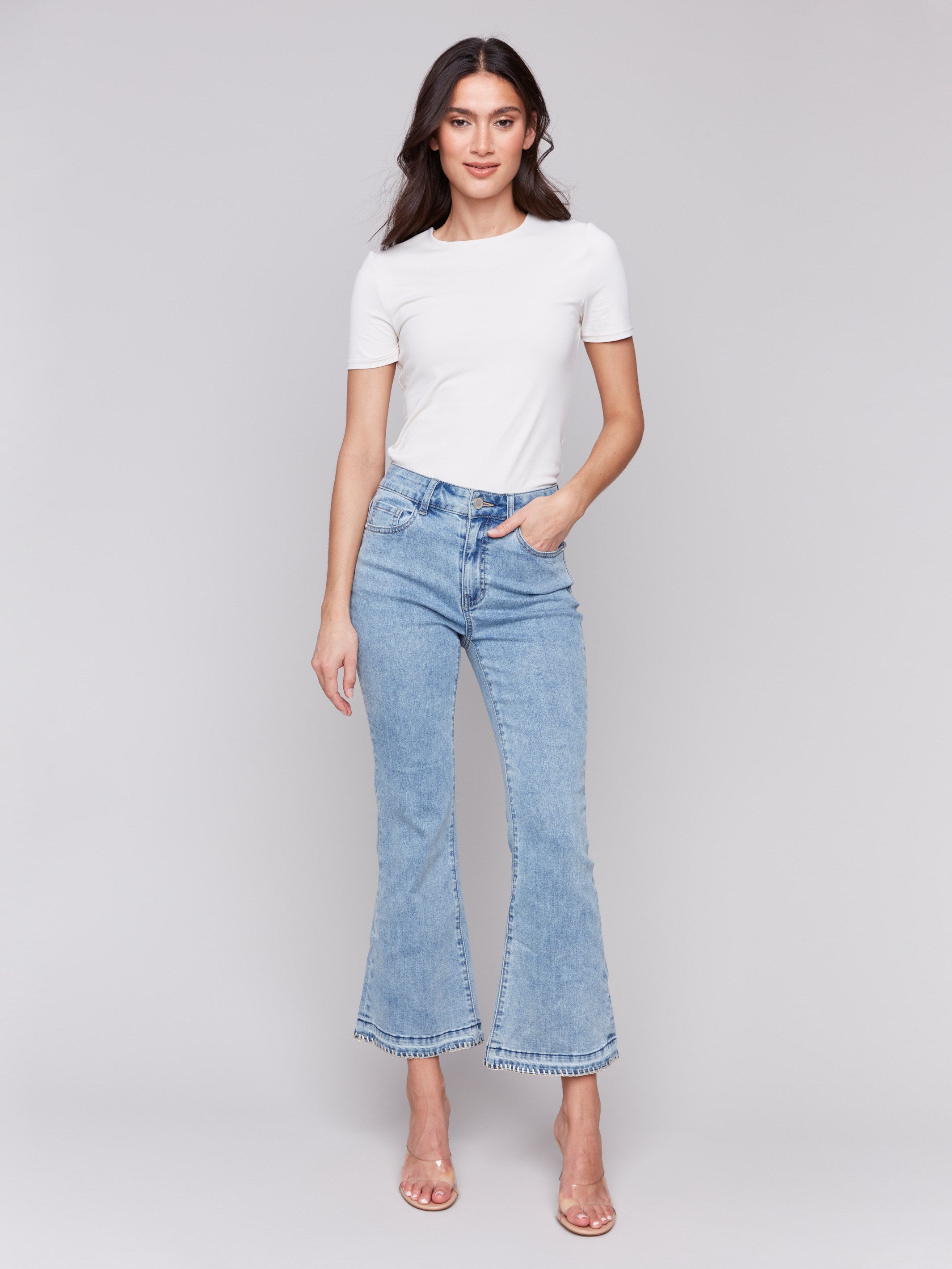 Stretch denim jeans featuring a five-pocket design by Charlie B.