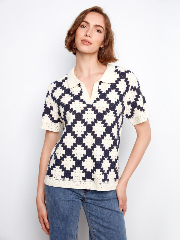 Navy and cream crochet top with a standout Johnny collar, highlighted by its intricate design pattern by Charlie B.