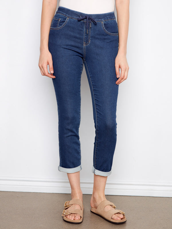 Indigo knit denim jogger pants featuring a regular rise and comfortable fit, perfect for everyday wear by Charlie B.