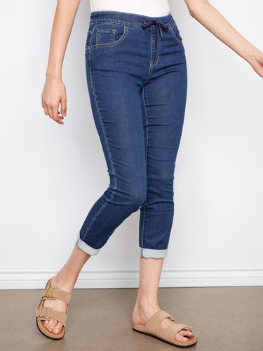 Indigo knit denim jogger pants in a slim fit, ideal for pairing with your favorite tops and shoes by Charlie B.