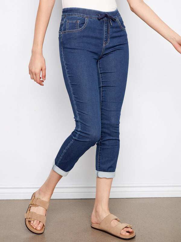 Indigo knit denim jogger pants in a slim fit, ideal for pairing with your favorite tops and shoes by Charlie B.