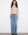 These jeans feature a wide leg, offering a relaxed fit for ultimate comfort and style by Charlie B.