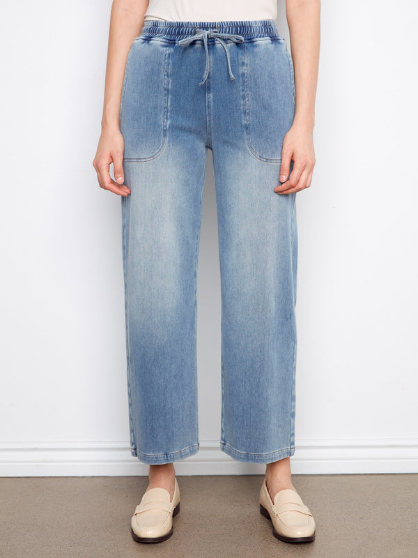 Light blue wide-leg jeans with cropped length for a modern look by Charlie B.