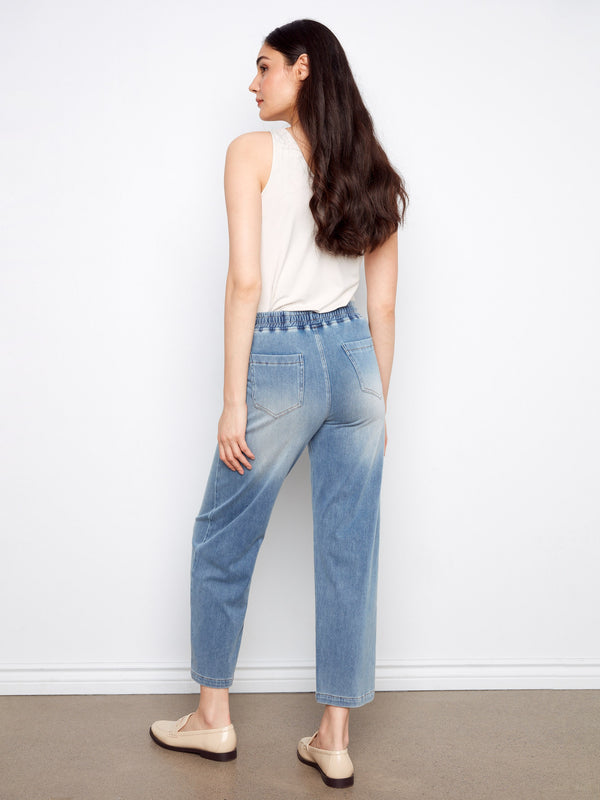 Wide-leg jeans crafted from stretch fabric for ease of movement by Charlie B.