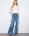 Medium blue wide-leg denim pants featuring a versatile stretch knit design, perfect for all-day comfort by Charlie B.