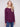 Berry knit sweater featuring a stylish boat neck design and ribbed long sleeves by Charlie B.