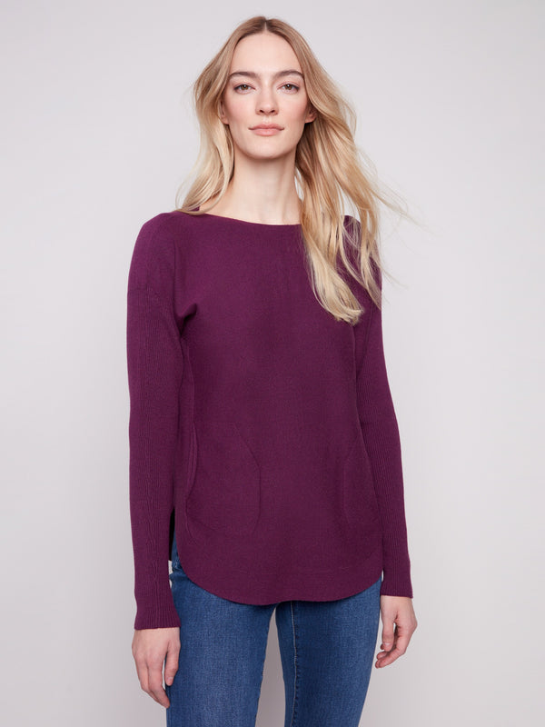 Berry knit sweater featuring a stylish boat neck design and ribbed long sleeves by Charlie B.