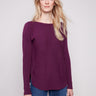 Berry knit sweater featuring a stylish boat neck design and ribbed long sleeves by Charlie B.
