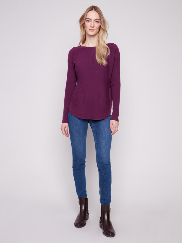Elegant berry knit sweater with practical front pockets and a chic rounded hem by Charlie B.